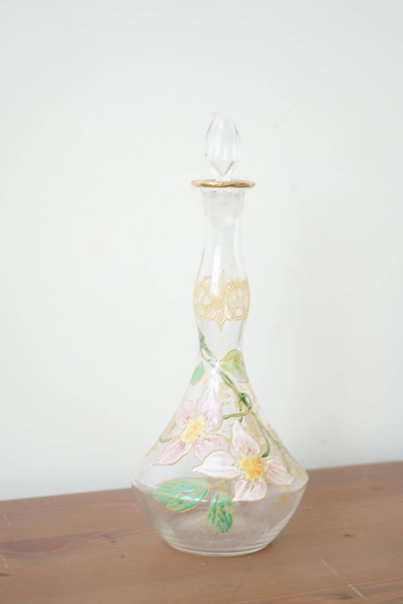 Legras (late 19th century) liqueur carafe in enamelled glass with floral decoration.