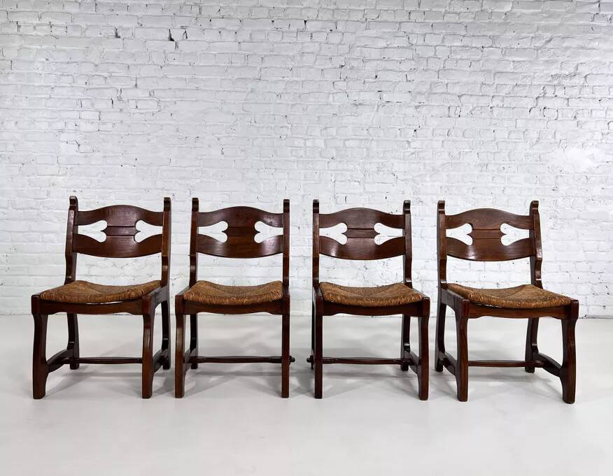 Set of 4 1950s chairs in oak with woven seats.