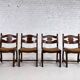 Set of 4 1950s chairs in oak with woven seats.