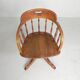 Oak office chair with a spring system and height adjustable, 1930s.
