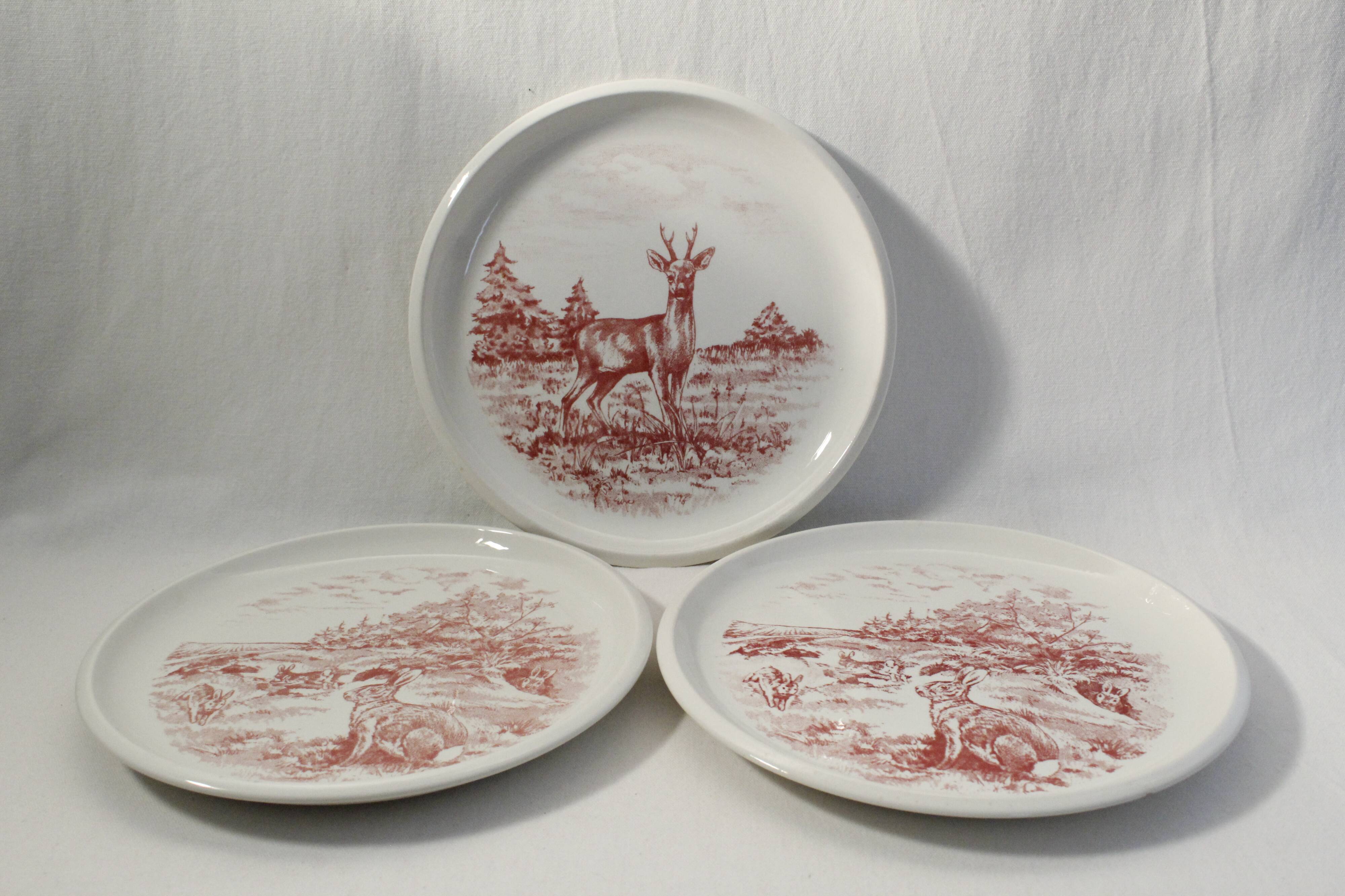 Set of 3 mismatched flat plates - red/burgundy decorations - deer and hare