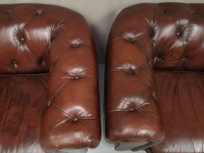 Brown brown leather chesterfield armchairs