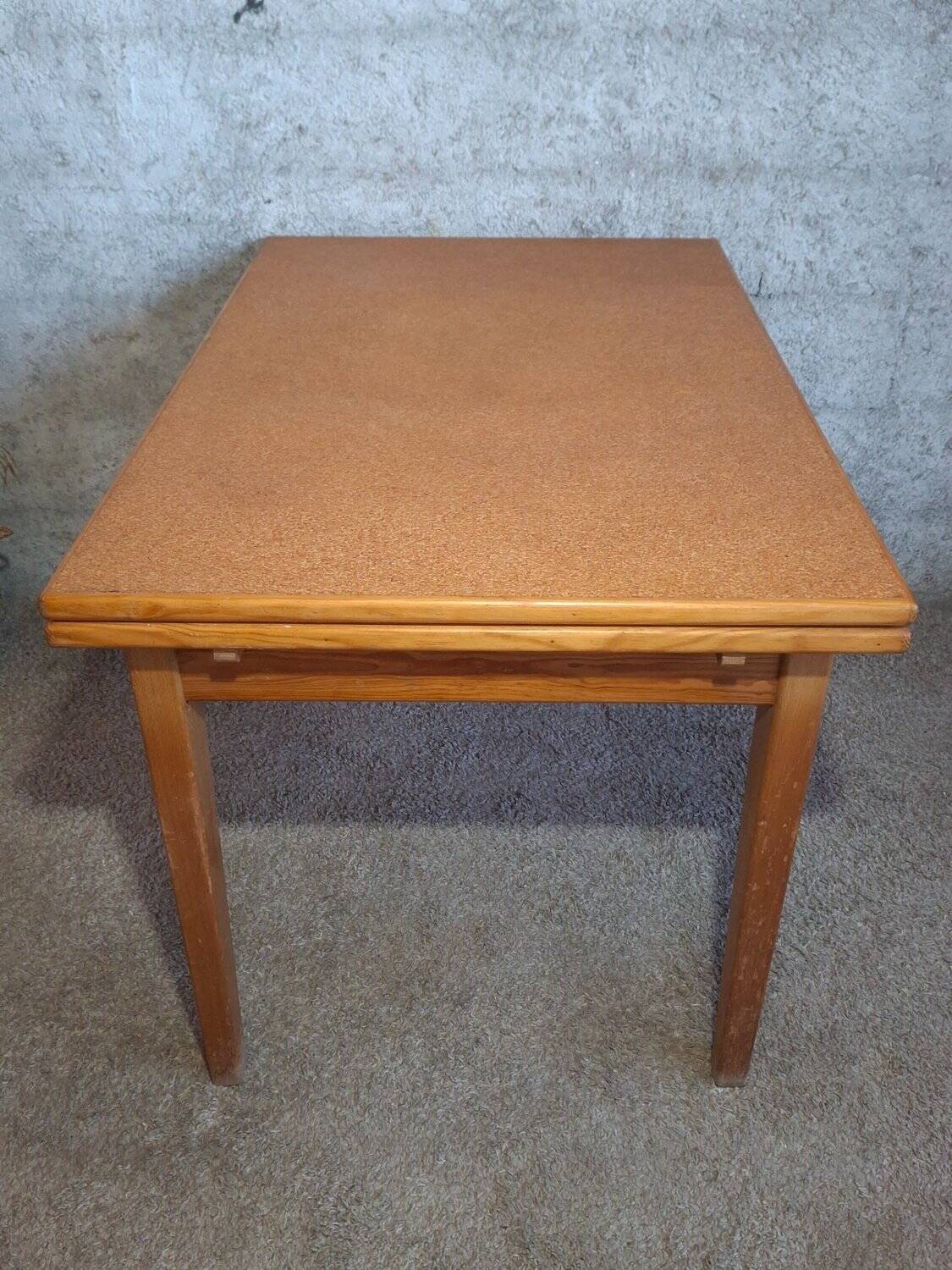 1950s dining table with sliding extensions
