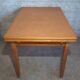 1950s dining table with sliding extensions