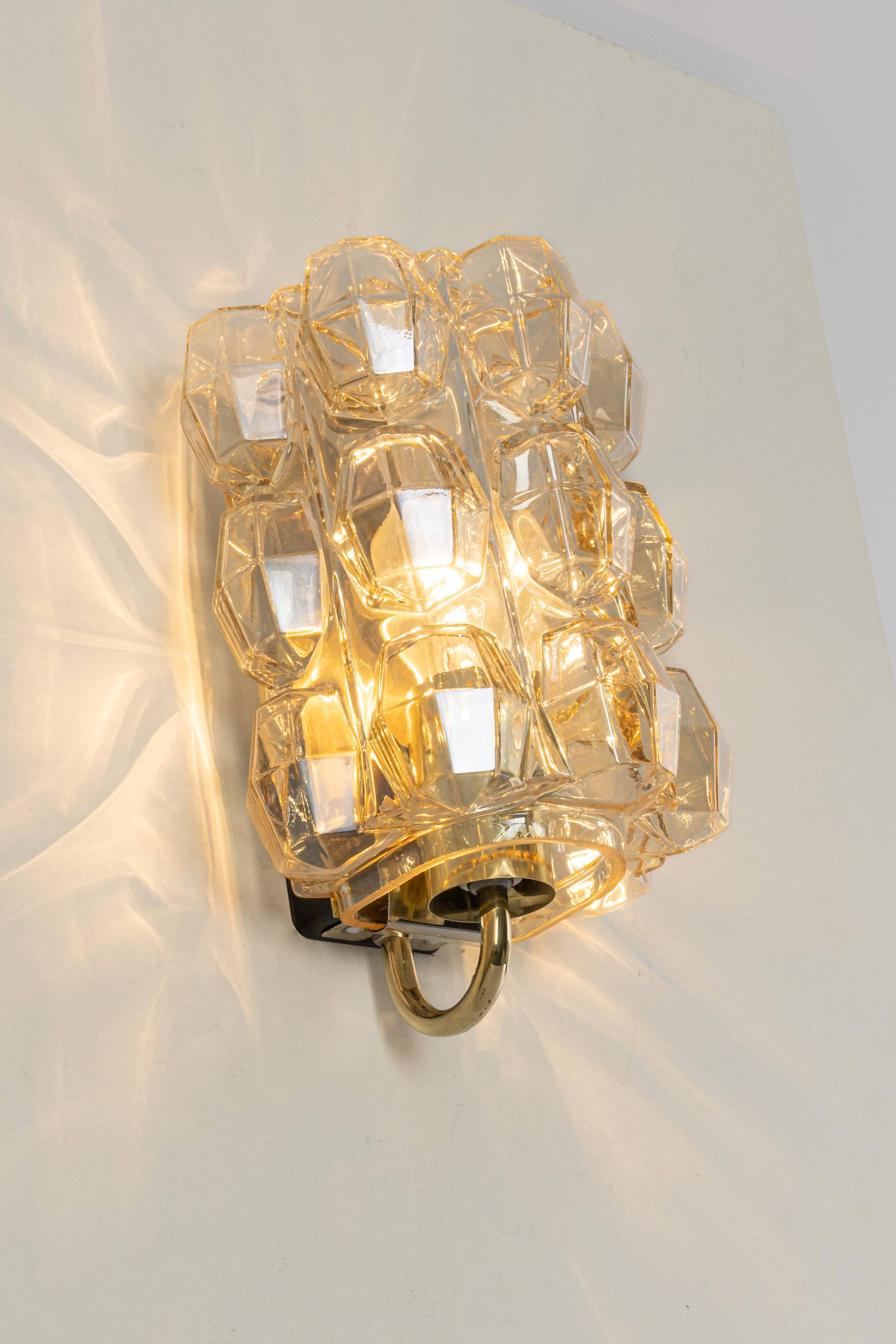 Large amber wall lamp in bubble glass by Helena Tynell, Limburg, Germany.