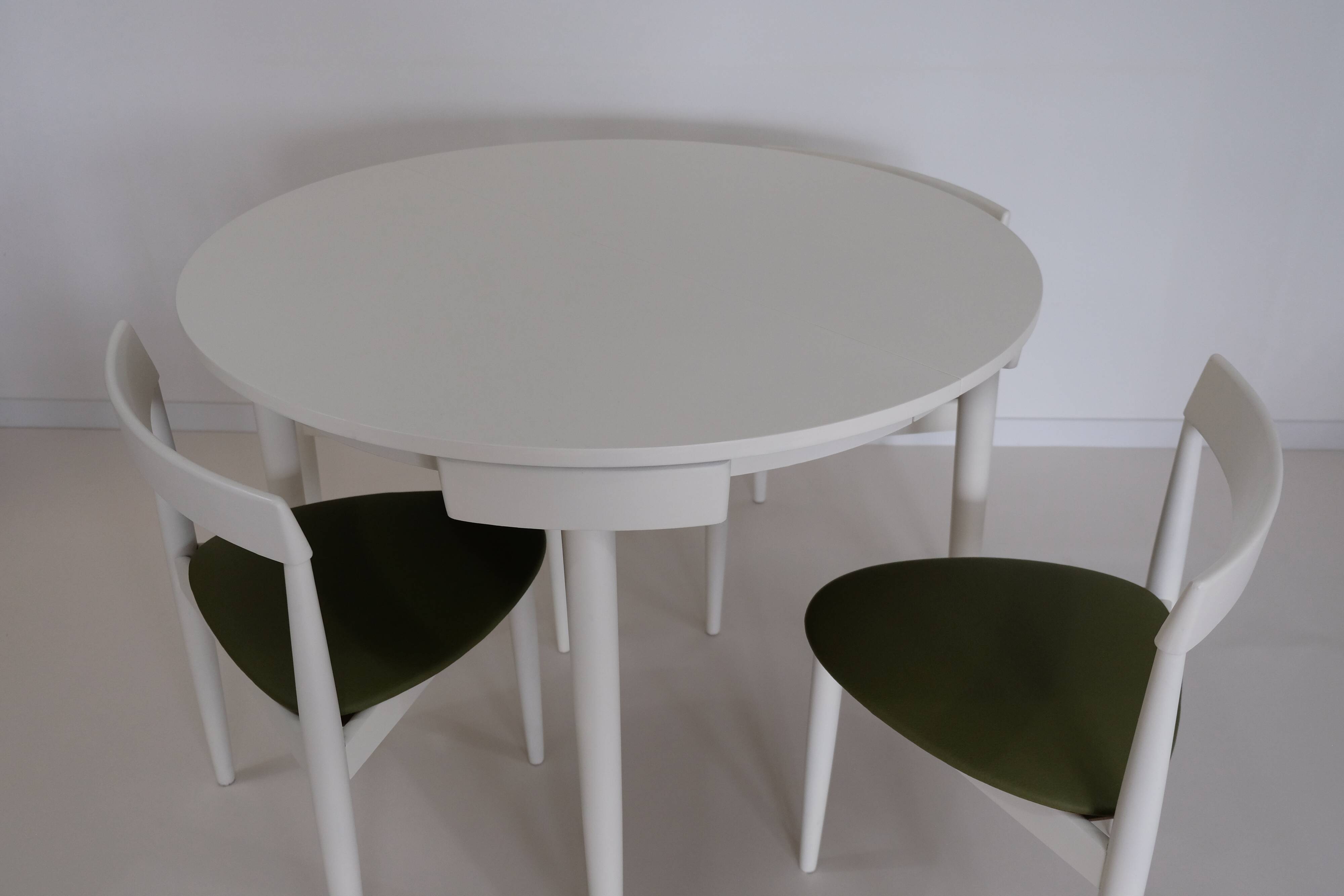 Table and chairs by Hans Olsen