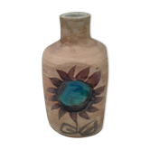 Vase bouteille céramique émaillée d'une fleur milieu XX ème . Ht 21,5 cm