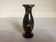 Small black veined marble vase