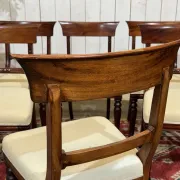Set of 2 armchairs and 6 English mahogany chairs from the 1950s.