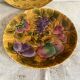 Round dish in barbotine with sarregumine fruit decoration