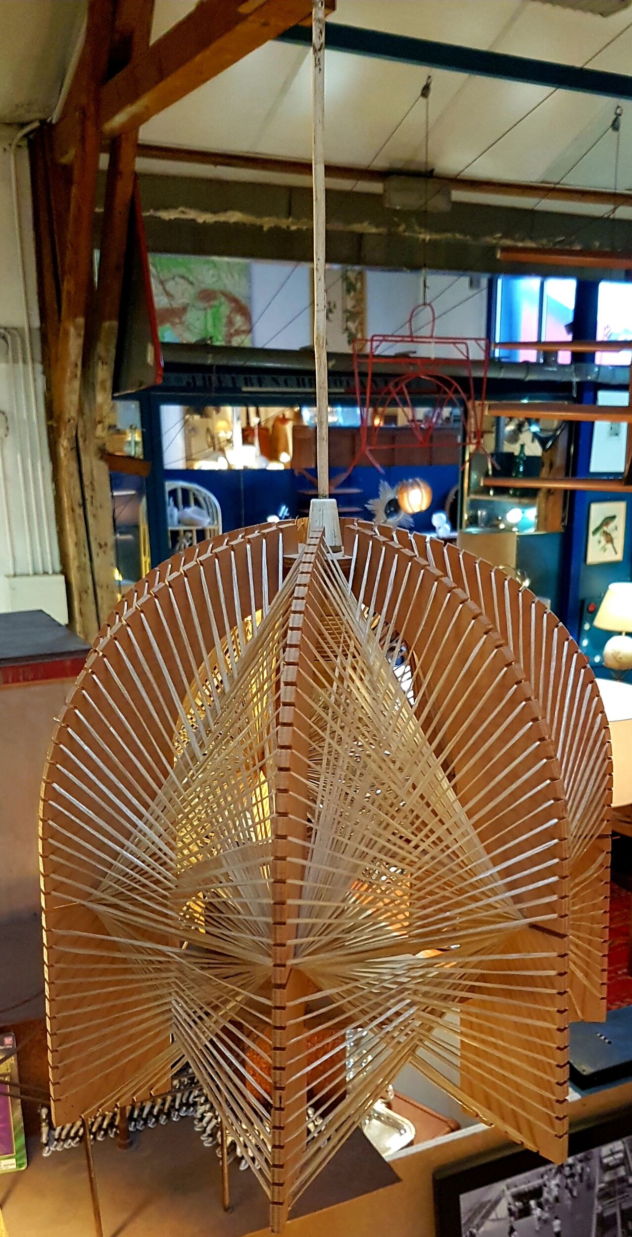 Hanging lamp in wood cut out clear raffia geometrical drawings 1970