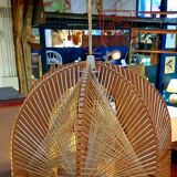 Hanging lamp in wood cut out clear raffia geometrical drawings 1970