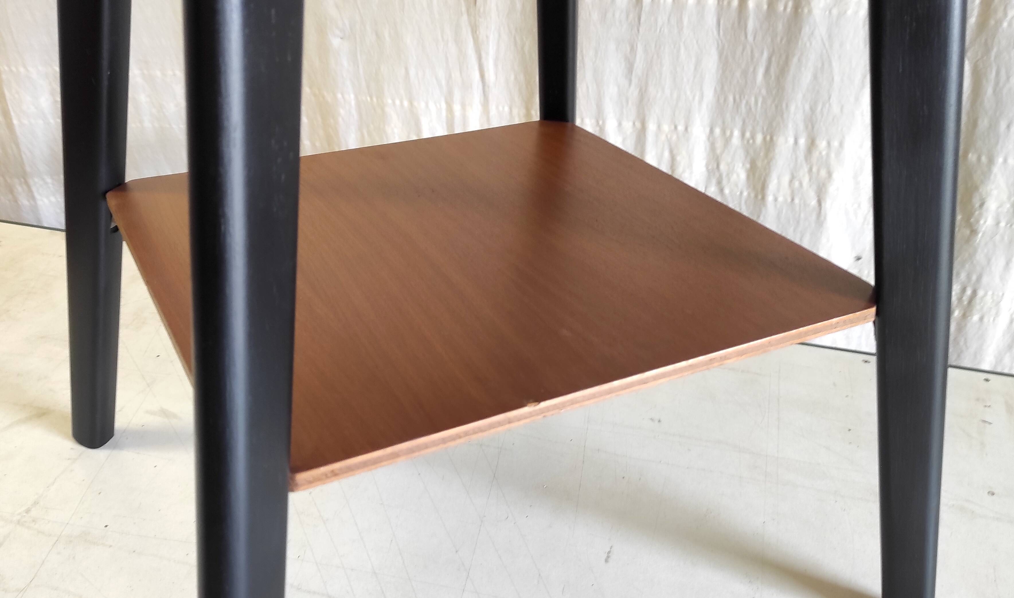 Modernist side table in wood, mid-20th century.