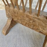 Pedestal table magazine in carved wood with gouge, mountain