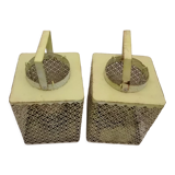 Metal lanterns with garden candles