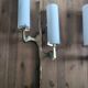 Pair of Arlus gilt bronze and opaline wall sconces