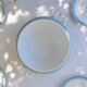 Large salad bowl from 1909 in porcelain by Oscar Shaller, blue and gold.