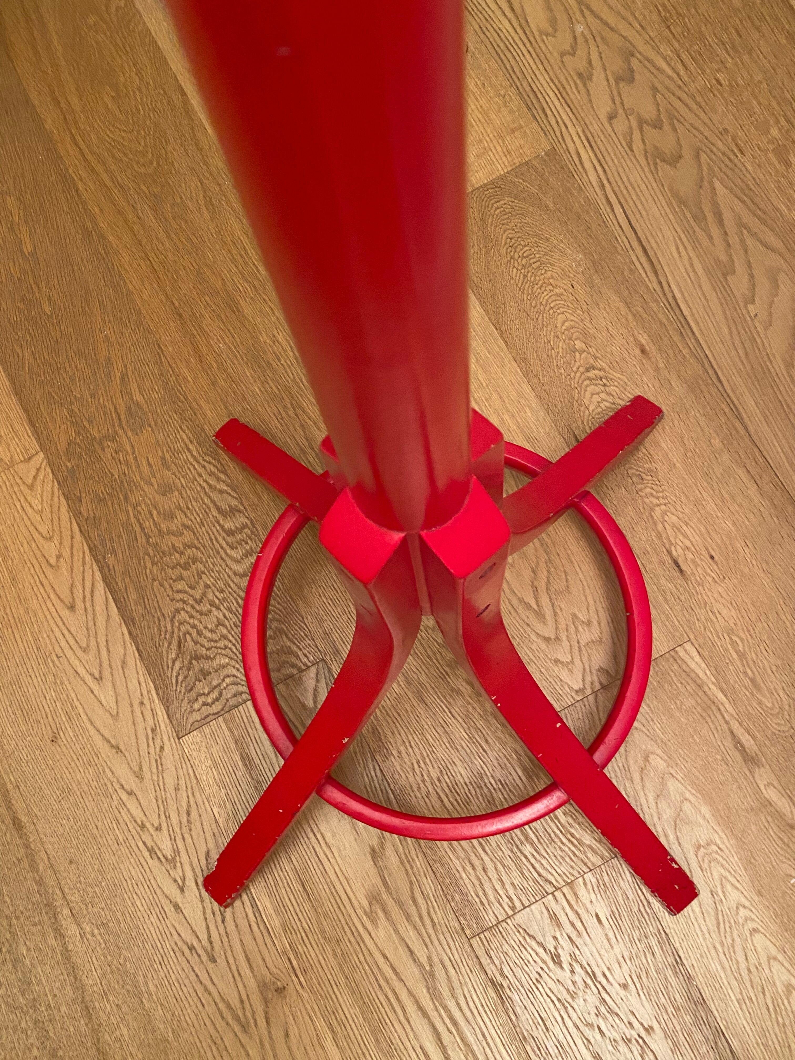Red Baumann parrot coat rack