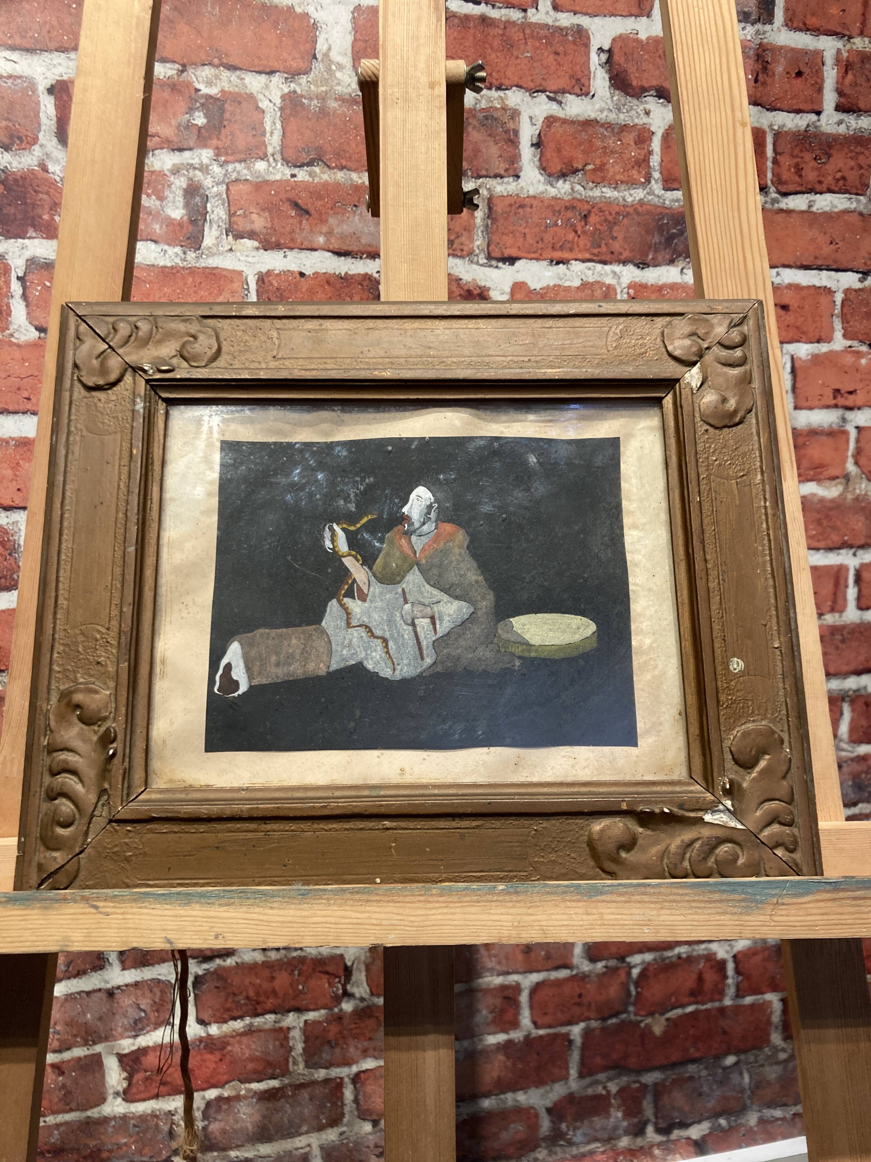 Framed painting of a man on mica.