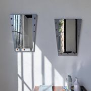 Pair of "Memphis" mirrors from the 80s in chrome and wood.