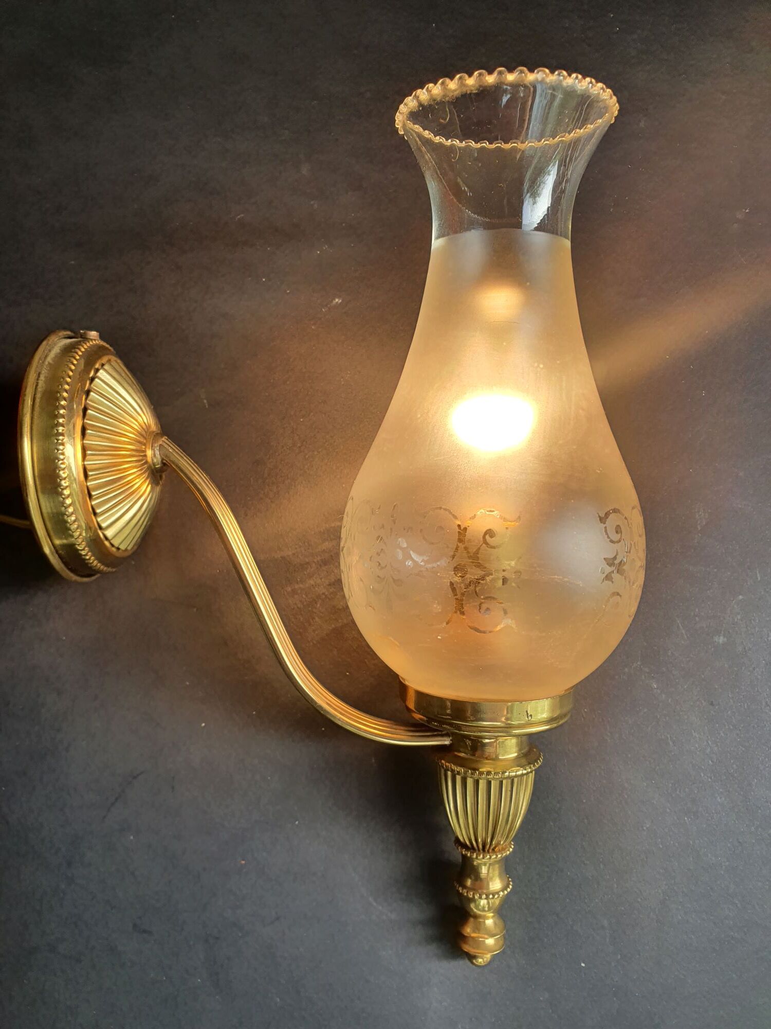 Pair of antique gold wall sconces