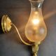 Pair of antique gold wall sconces