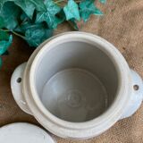 White pot in glazed earth