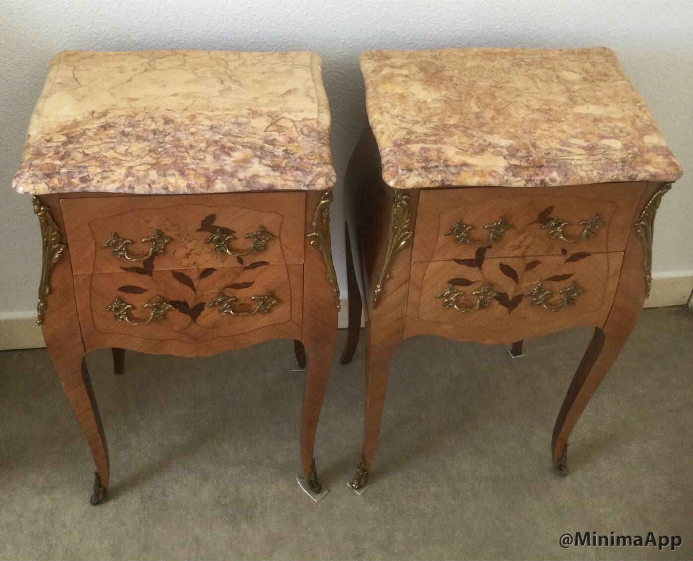 Pair of curved bedside tables in the Louis XV style with noble wood marquetry from the period.