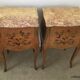 Pair of curved bedside tables in the Louis XV style with noble wood marquetry from the period.