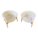 Mid-century lounge chairs in sheepskin/shearling and stained wood, Sweden, 1962.