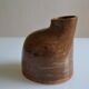 Bottle vase with an off-centre neck in ceramic, signature with a fish to be identified.