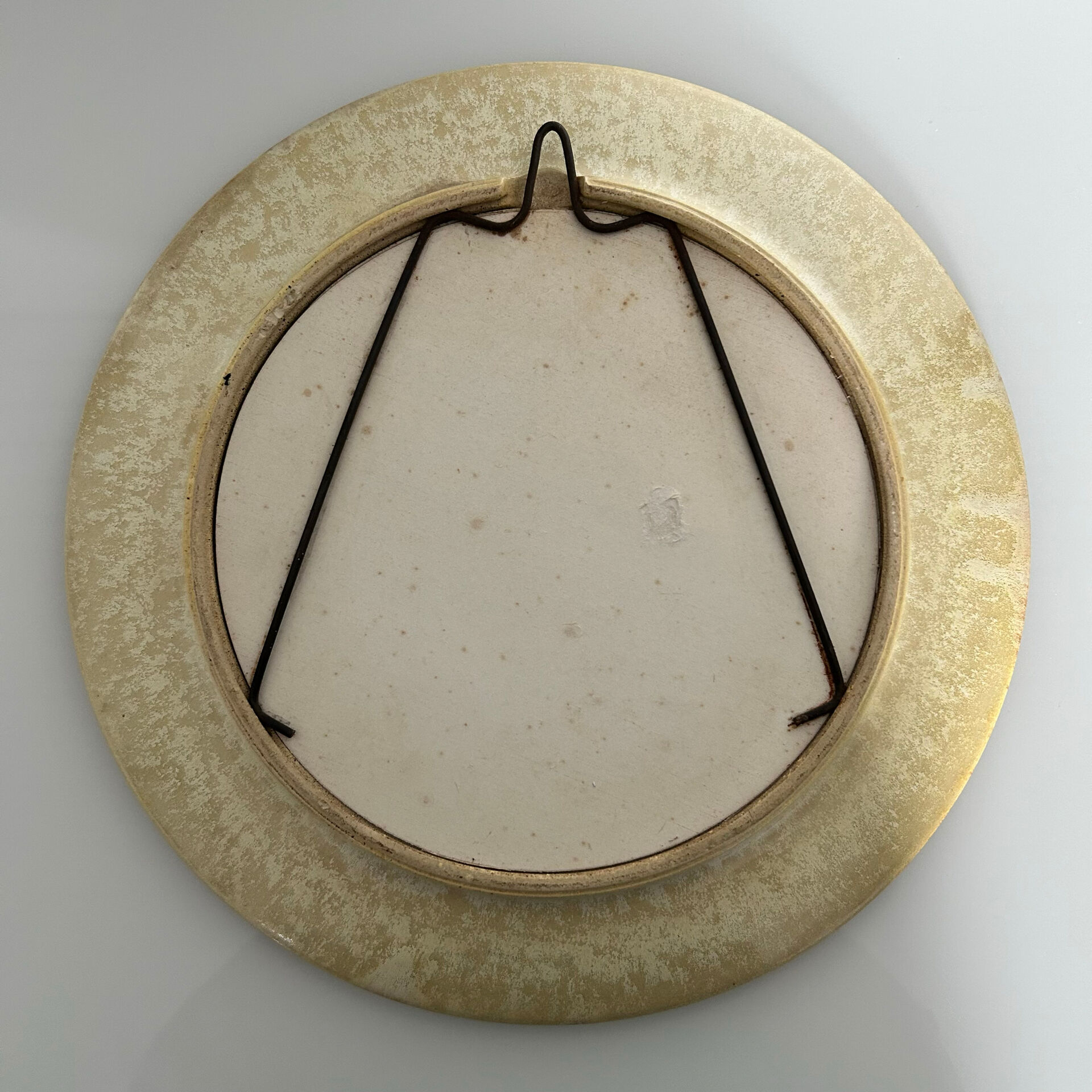 Chiselled stone mirror
