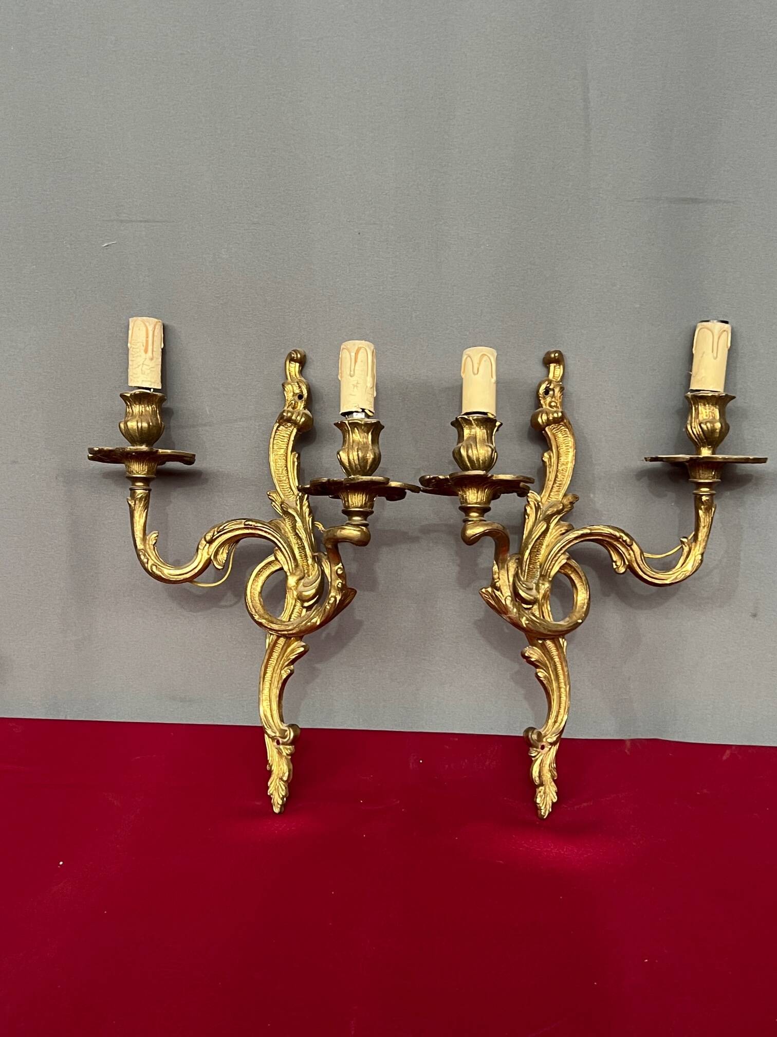 Pair of Rococo gilded solid bronze wall lights.