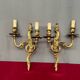 Pair of Rococo gilded solid bronze wall lights.