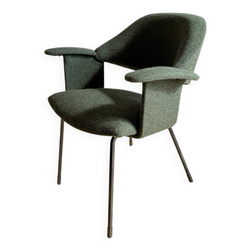 Curved vintage wool armchair from the 1960s
