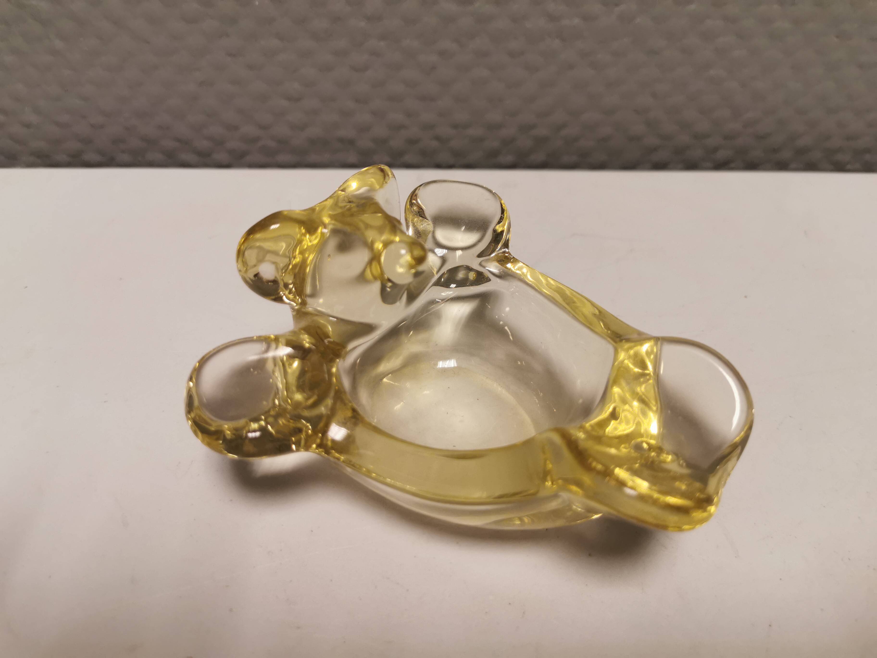 Mid-century yellowish crystal teddy bear ashtray from Vannes Le Châtel France