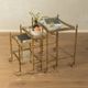 Set of 3 vintage Hollywood Regency nesting tables with brass frame and glass tops (1960s)