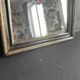 Miroir Napoléon III en bois noir et doré, XIXe siècle