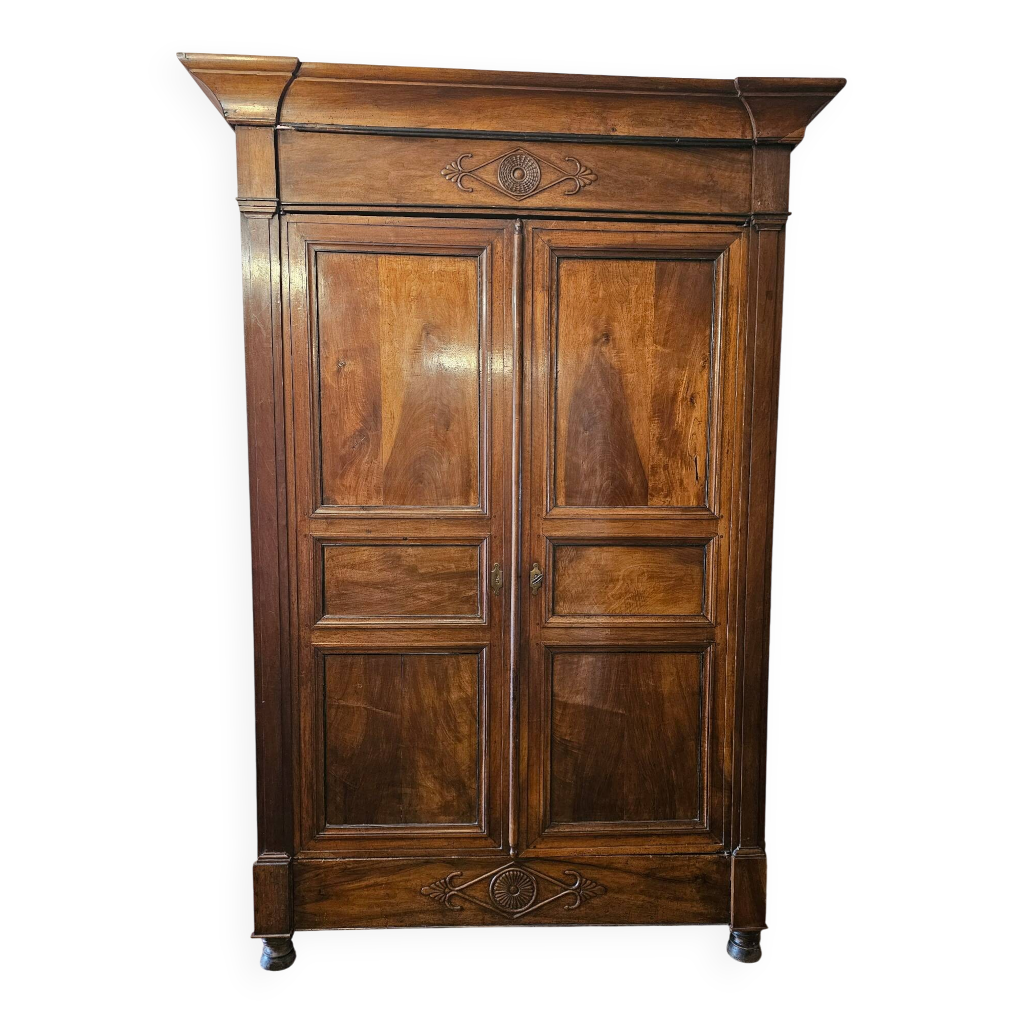 Directoire period wardrobe in solid walnut.