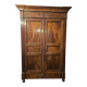 Directoire period wardrobe in solid walnut.