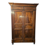 Directoire period wardrobe in solid walnut.