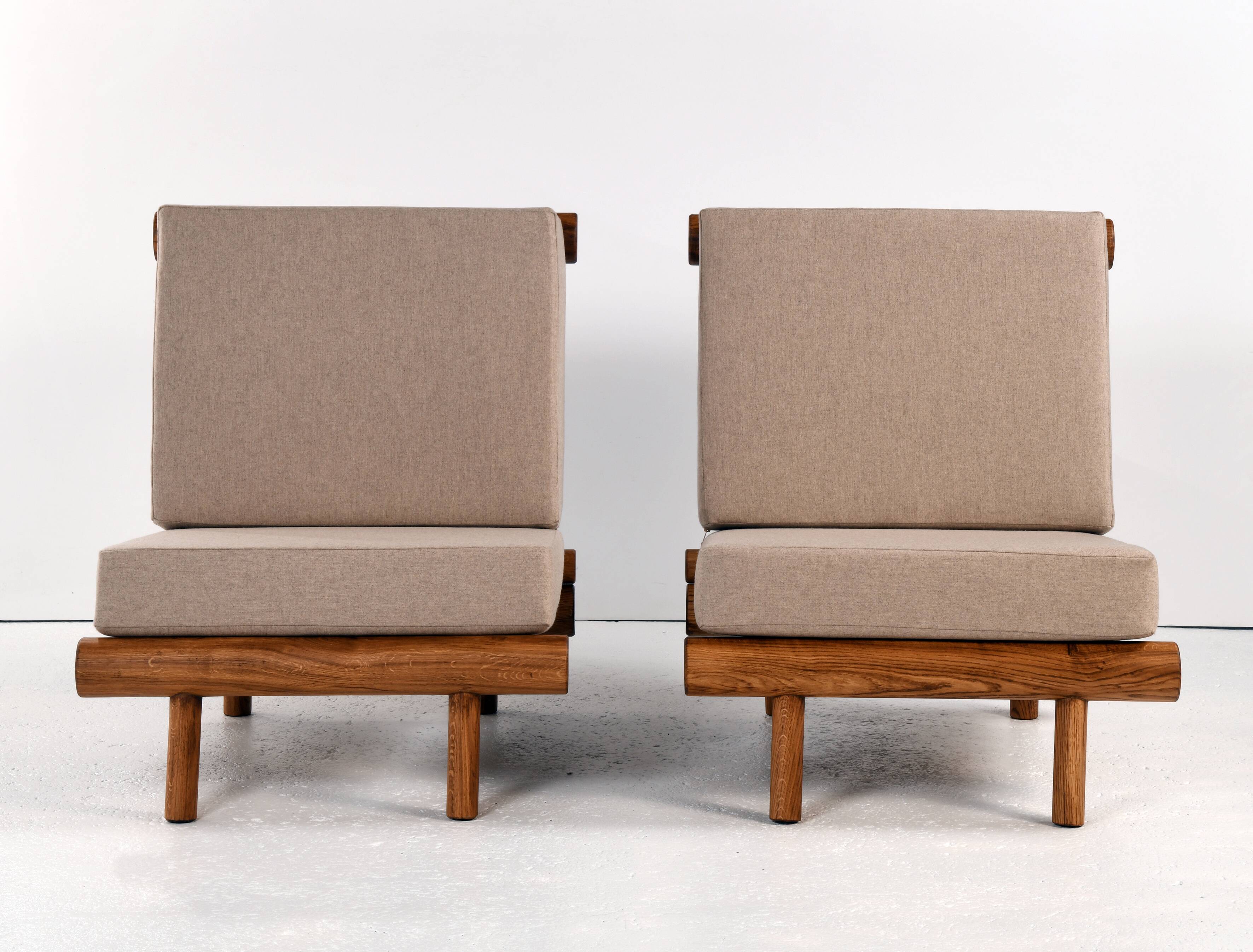 Pair of low chairs called La cachette selected by Charlotte Perriand