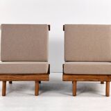 Pair of low chairs called La cachette selected by Charlotte Perriand
