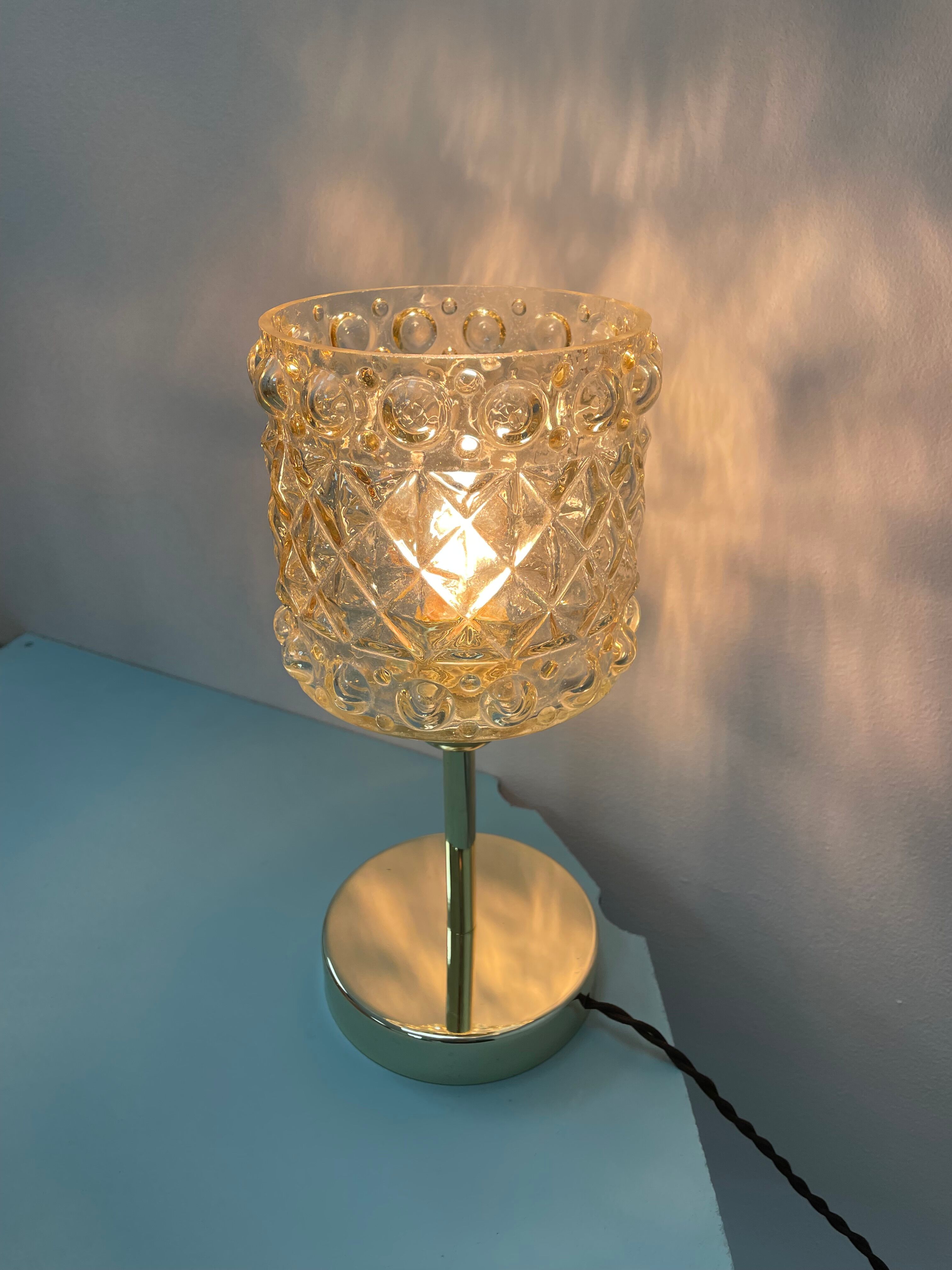 Table lamp - globe in amber glass