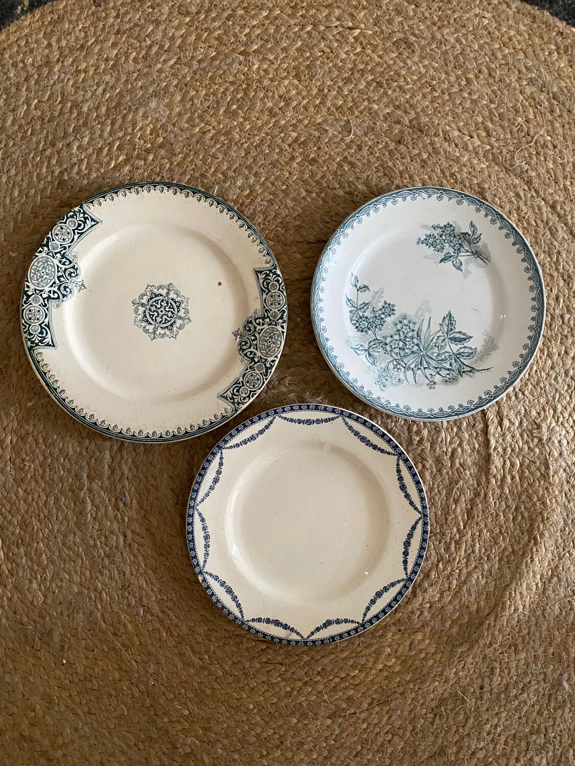 3 mismatched iron earth flat plates in green.