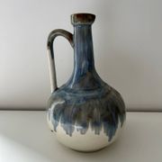 Cherry-decorated earthenware carafe