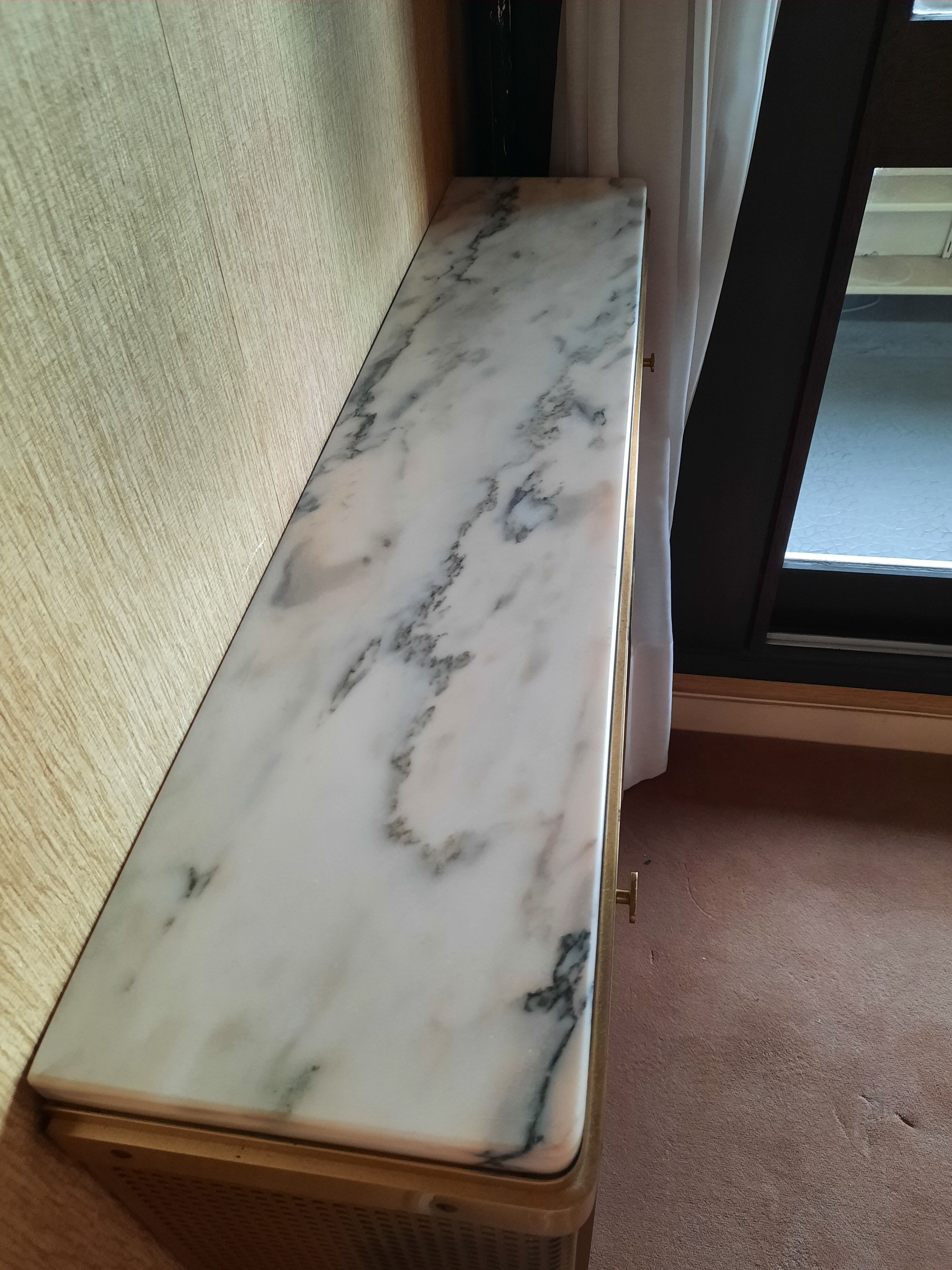 Marble and brass radiator cover