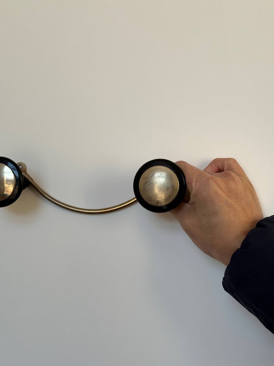 Wall mounted coat rack