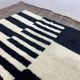Off-white Moroccan rug with geometric patterns, 250cm x 150cm