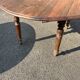 Round walnut table, turned legs in the Louis-Philippe style, late 19th century